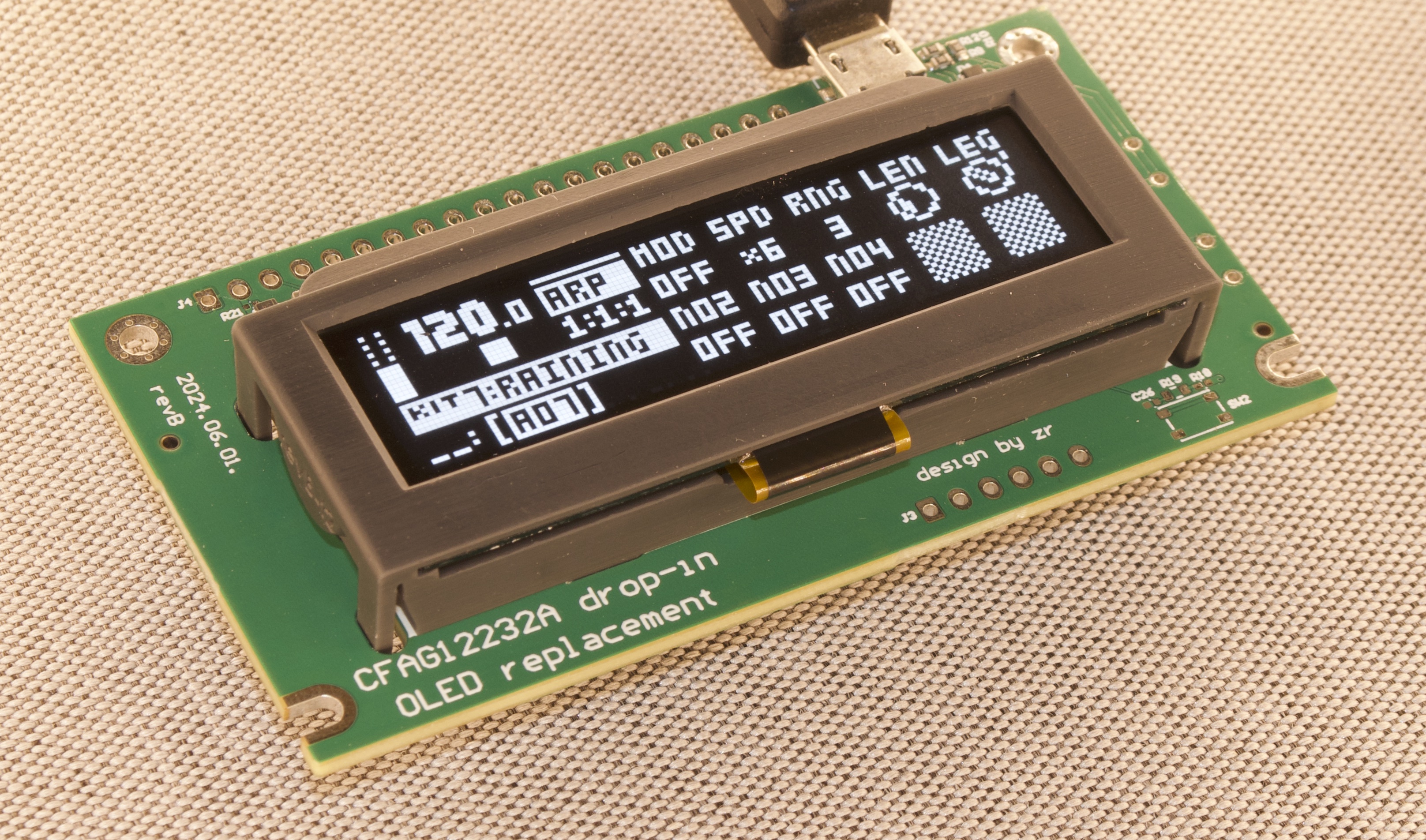 Photo of a white OLED display module for Elektron Analog Mk1
device.